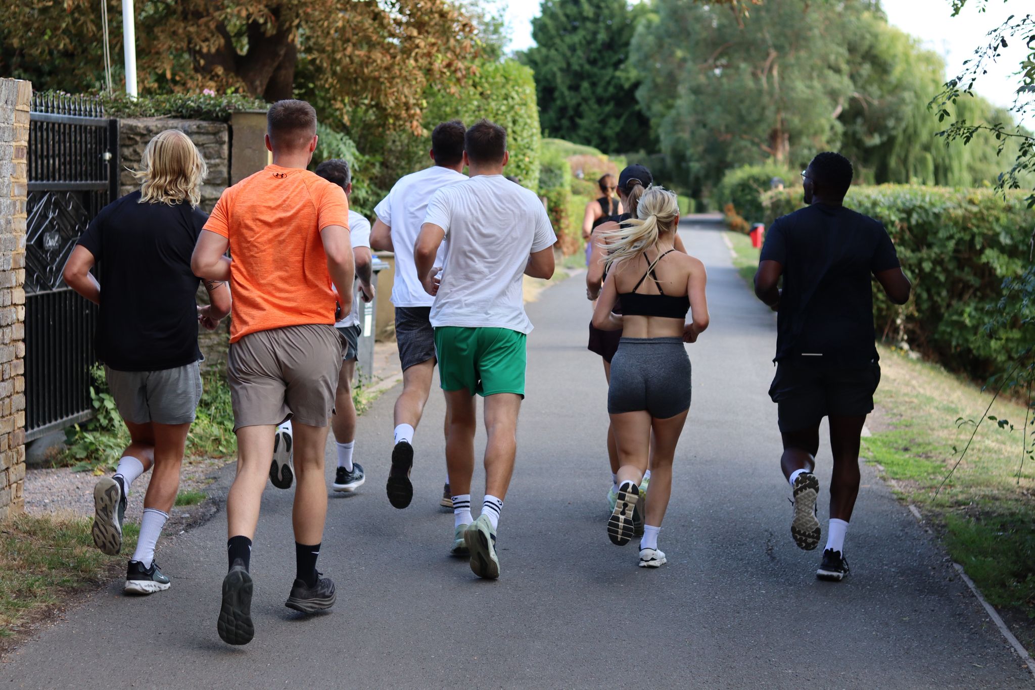 The Move More Pro run club out on a summer evening run