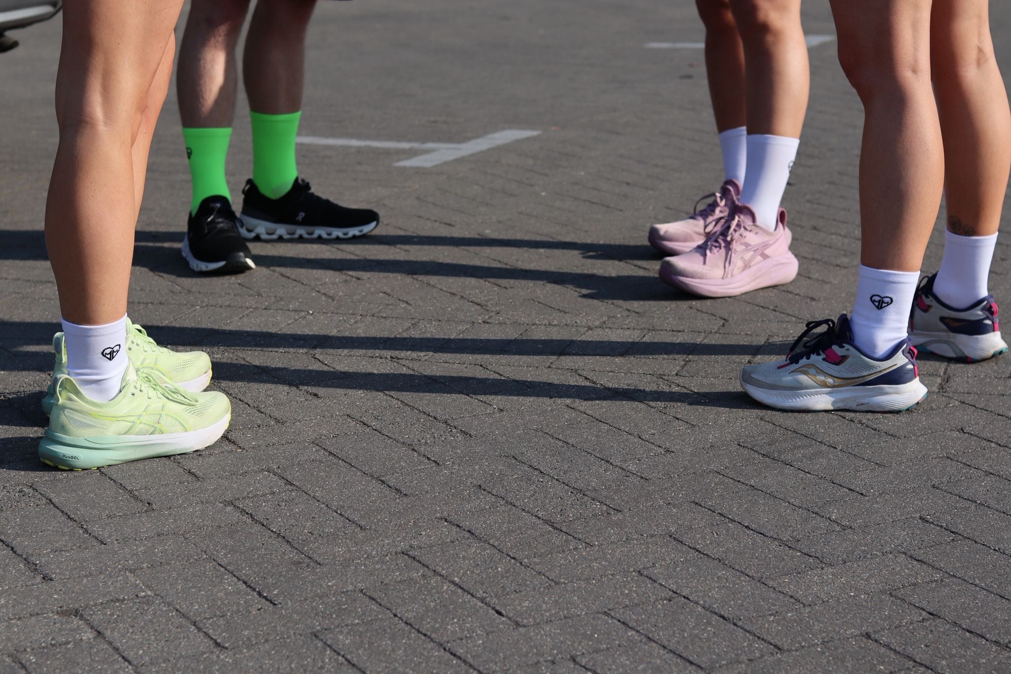 The run club in green and white Move More socks